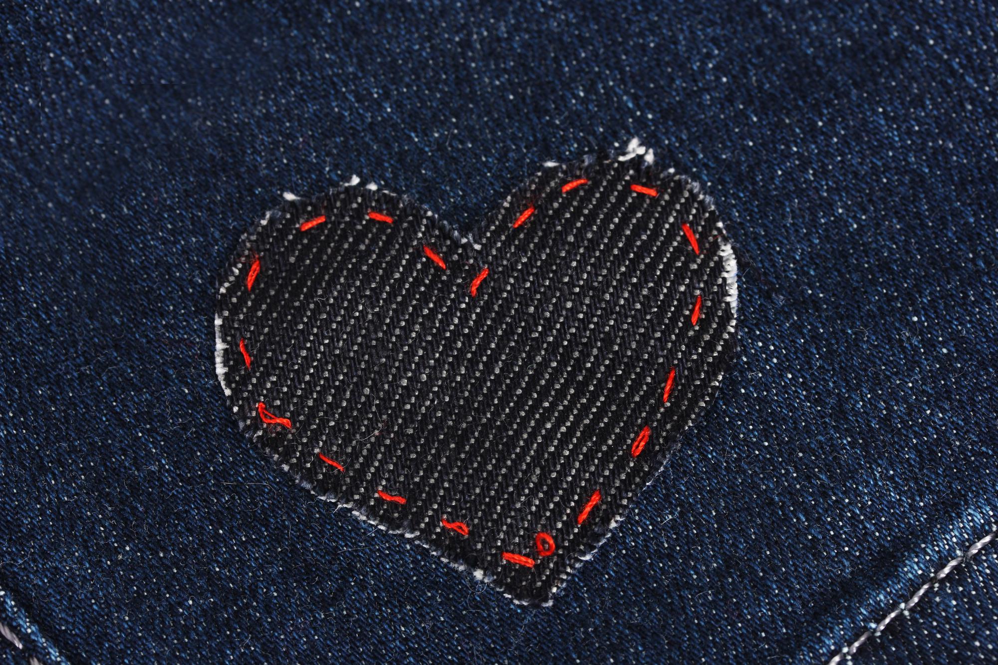 Embroidered patch with neon thread on denim
